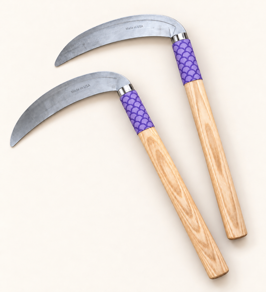 Handmade hardwood training kama with purple wave-pattern wrap and Made in USA engraving on the blades